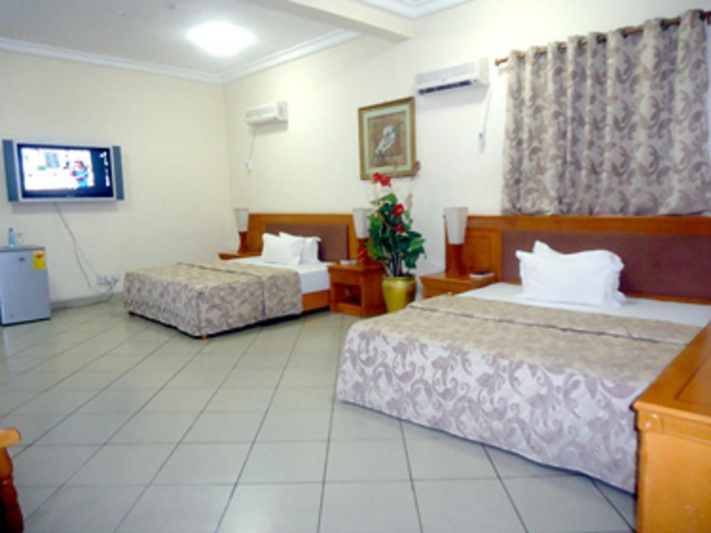 Sunset Hotel Kumasi Rum bild